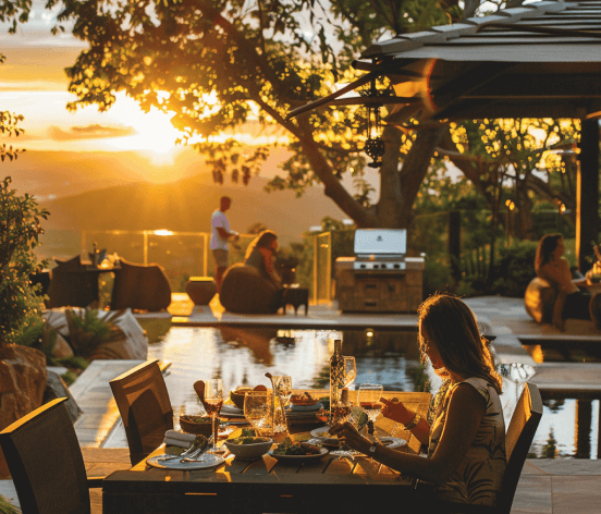 Custom outdoor living scene overlooking the Huntsville and Madison, AL mountains at sunset.